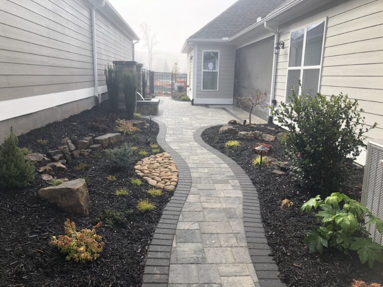 Paver patio and walkway with landscape plantings by Stone Edge Landscapes, North West Georgia