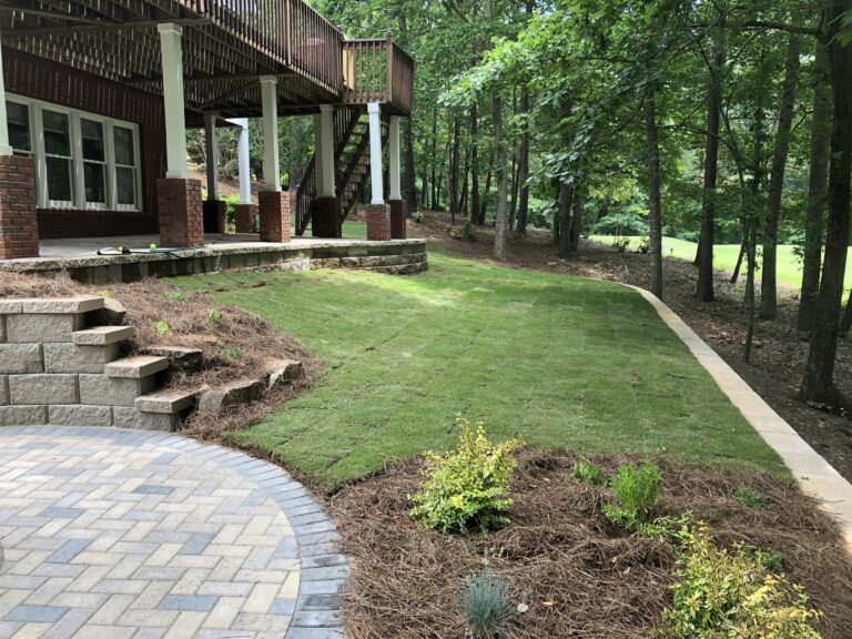 Stone retaining wall and steps with landscape plantings by Stone Edge Landscapes, North West Georgia