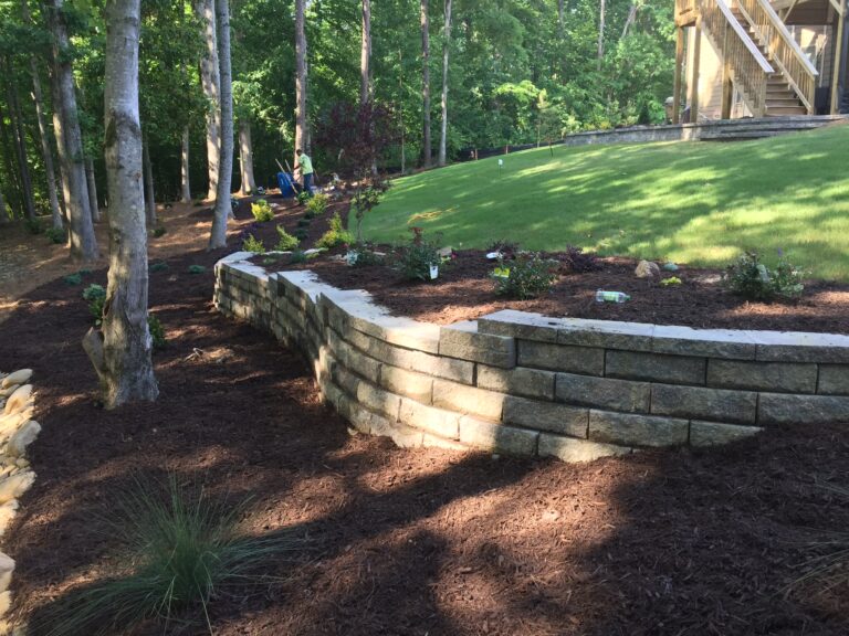Stone retaining wall and steps with landscape plantings by Stone Edge Landscapes, North West Georgia