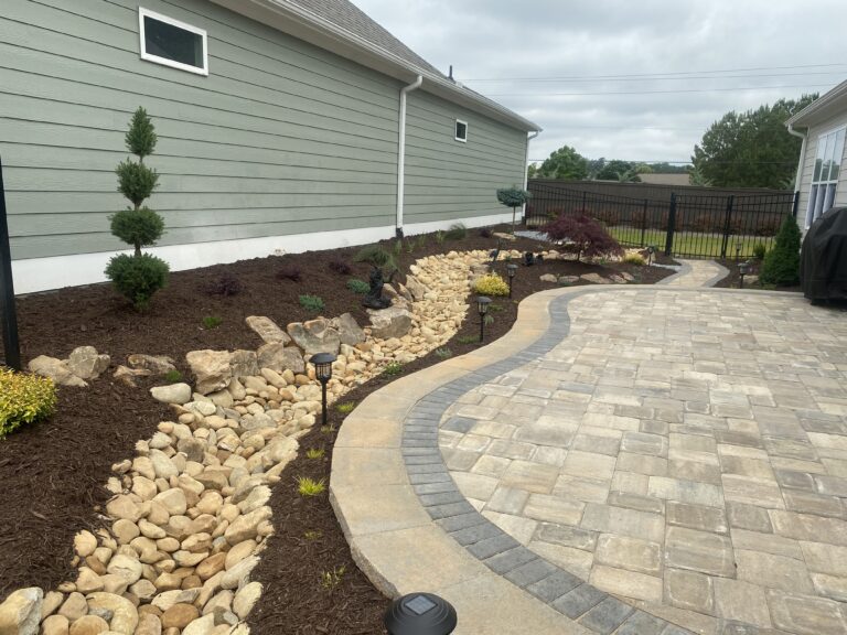 Paver patio and walkway with landscape plantings by Stone Edge Landscapes, North West Georgia