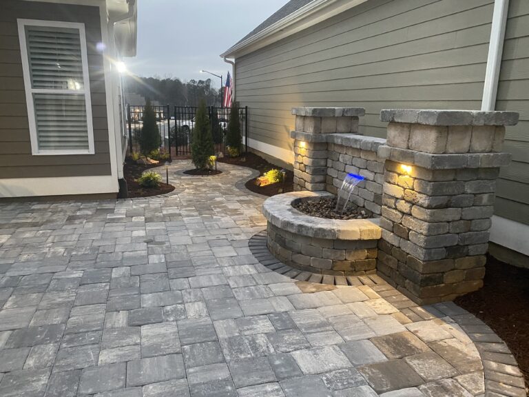 Fire pit and outdoor living area with paver patio and walkway by Stone Edge Landscapes, North West Georgia