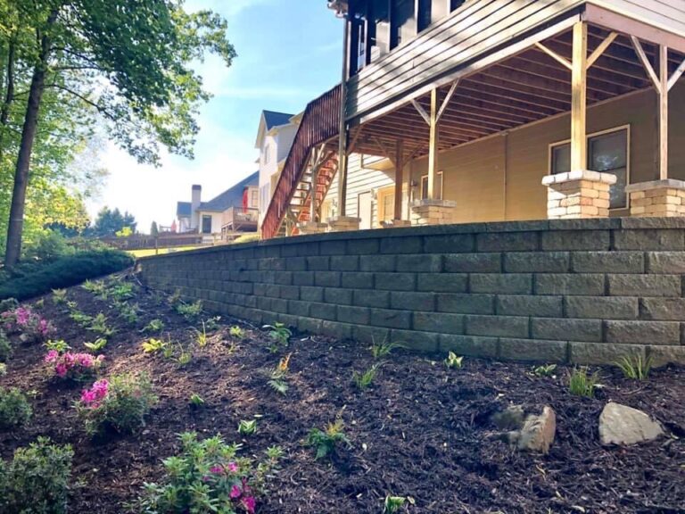 Stone retaining wall and steps with landscape plantings by Stone Edge Landscapes, North West Georgia
