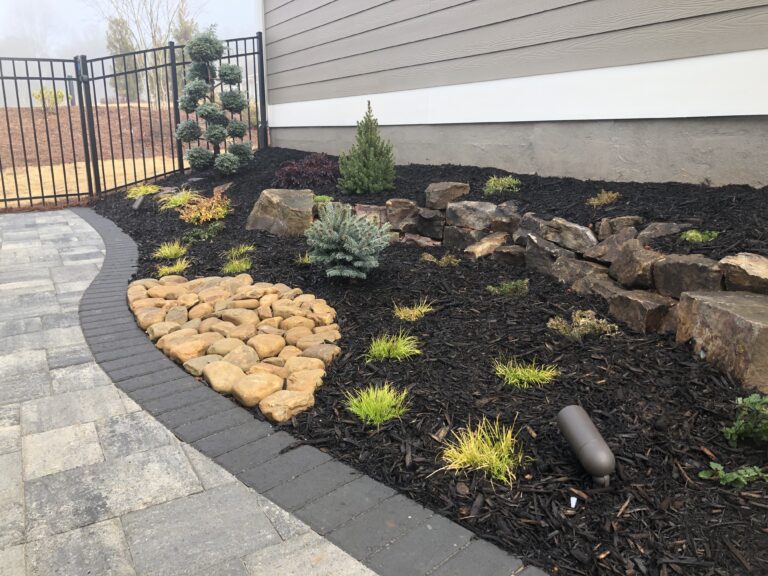 Paver patio and walkway with landscape plantings by Stone Edge Landscapes, North West Georgia