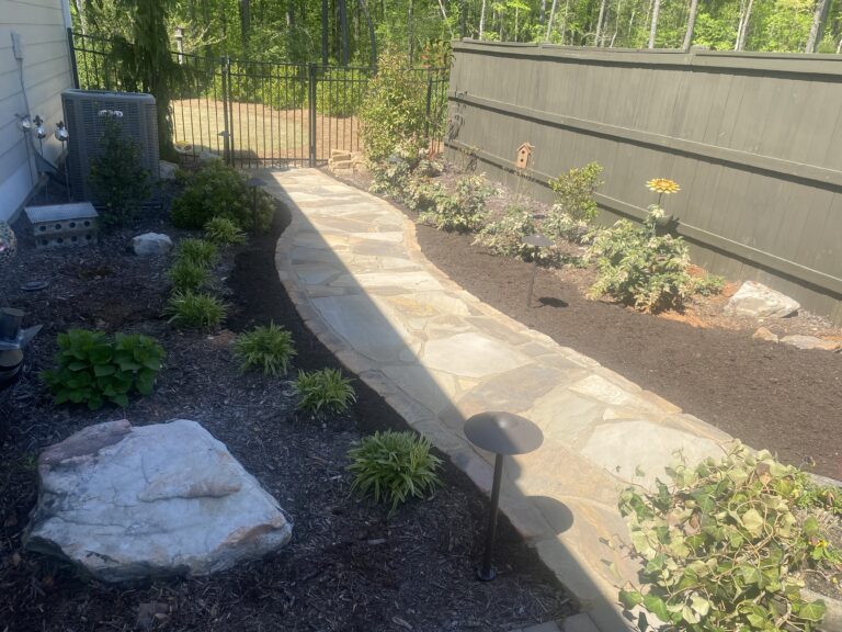 Paver patio and walkway with landscape plantings by Stone Edge Landscapes, North West Georgia