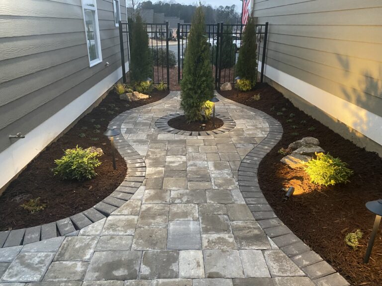 Paver patio and walkway with landscape plantings by Stone Edge Landscapes, North West Georgia