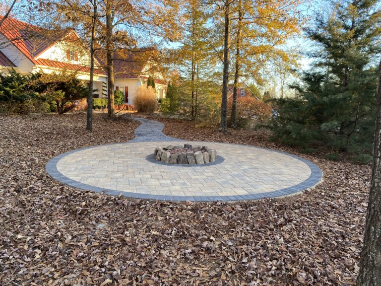Fire pit and outdoor living area by Stone Edge Landscapes, North West Georgia