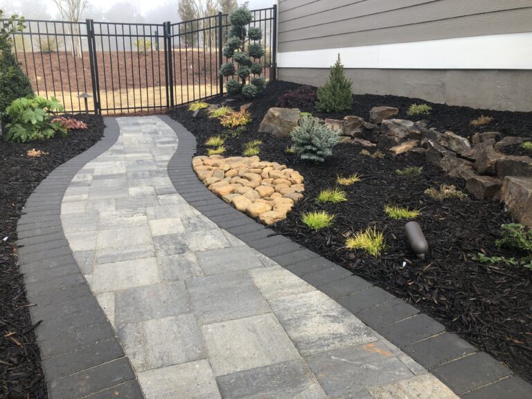 Paver patio and walkway with landscape plantings by Stone Edge Landscapes, North West Georgia