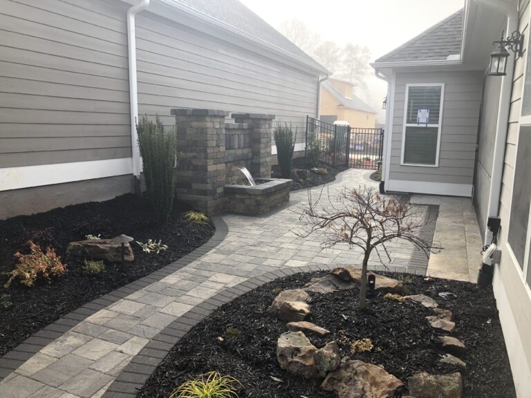 Paver patio and walkway with landscape plantings by Stone Edge Landscapes, North West Georgia