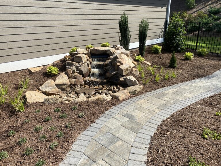 Water feature with paver patio and walkway by Stone Edge Landscapes, North West Georgia
