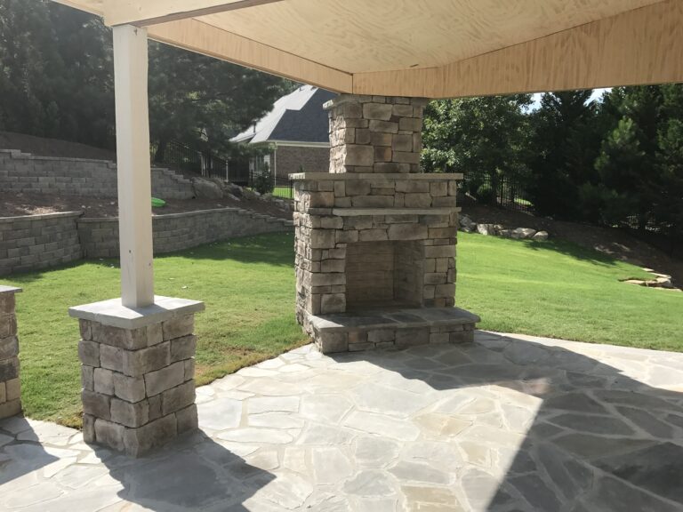Fire pit and outdoor living area by Stone Edge Landscapes, North West Georgia